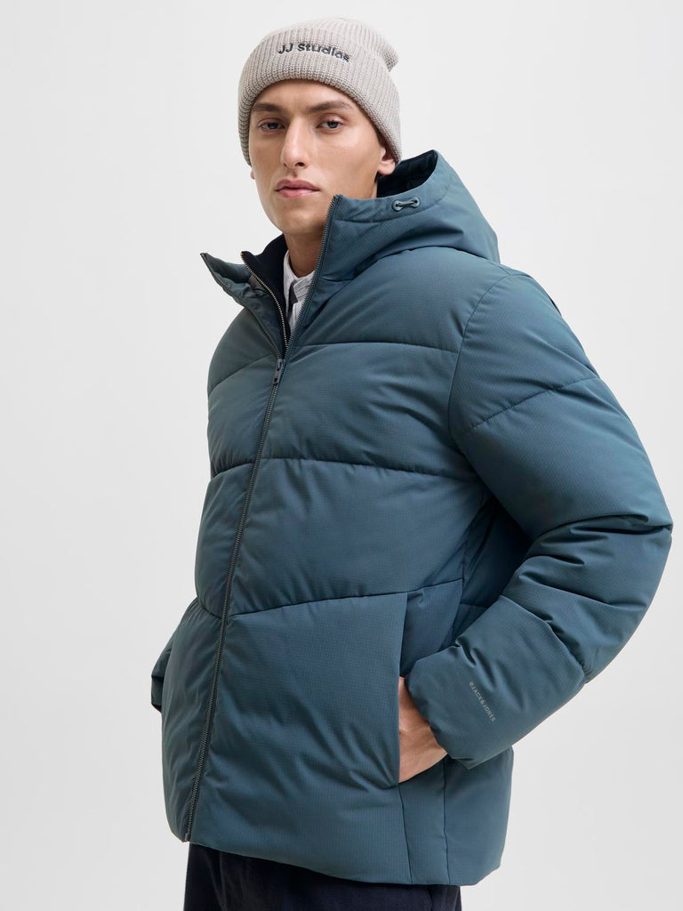 Jack and Jones Person wearing a blue puffer jacket 